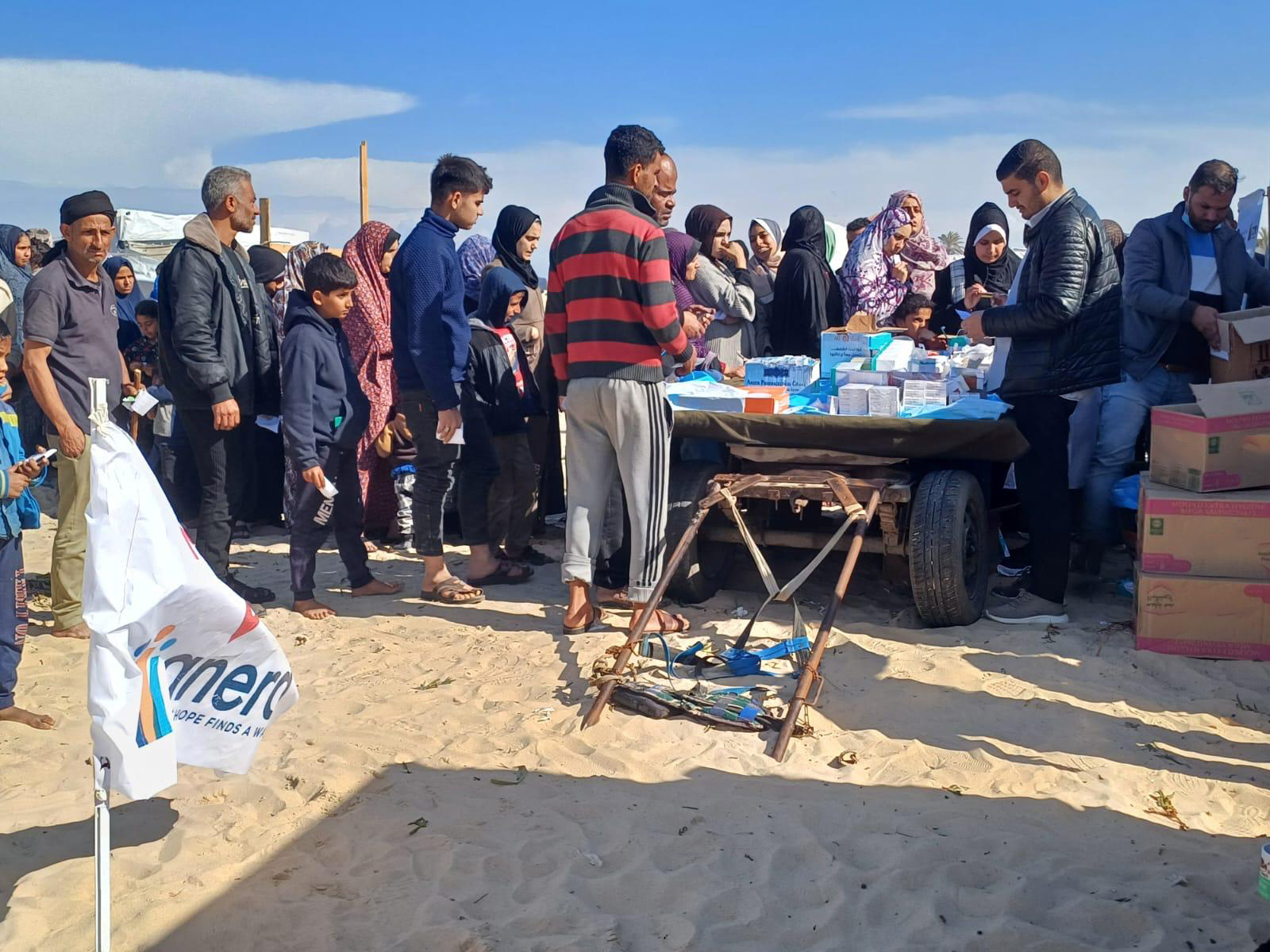 A queue at a healthcare centre in Gaza operated by Tearfund partner Anera. Photo credit: Anera/IHP. With thanks to Tearfund for providing this for illustration.